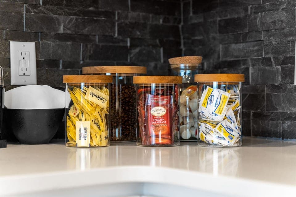 Assorted teas, creamer and sweetner