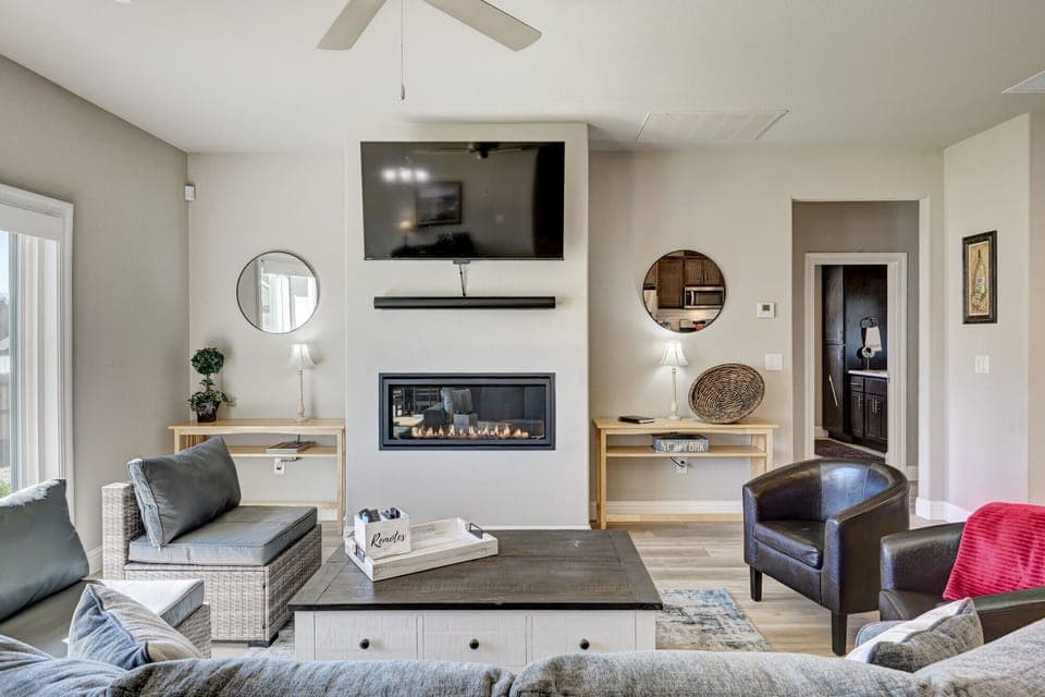 Living area with flat screen tv and propane fireplace