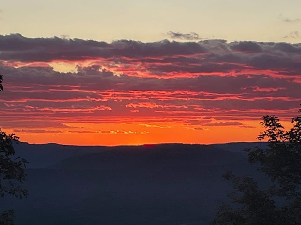 Enjoy beautiful sunsets from inside or outside
