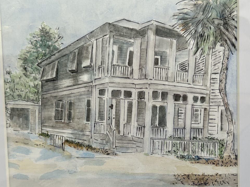 A charming watercolor illustration showcases this historic two-story wooden building surrounded by lush tropical landscaping and mature palm trees.