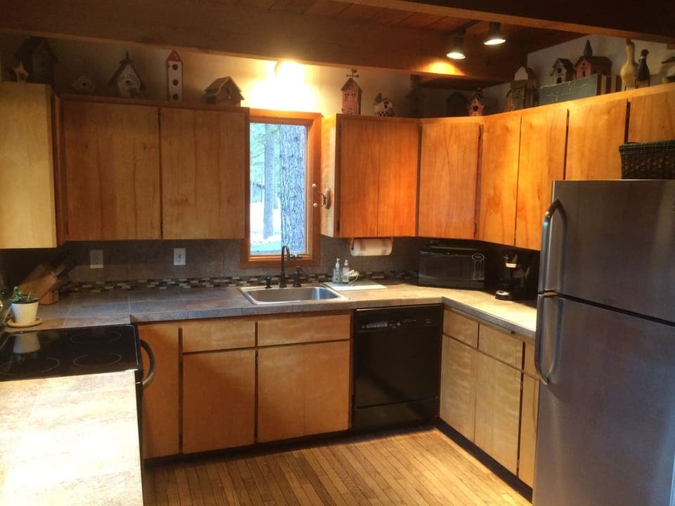Complete kitchen including dishwasher, stove/oven, microwave, disposal