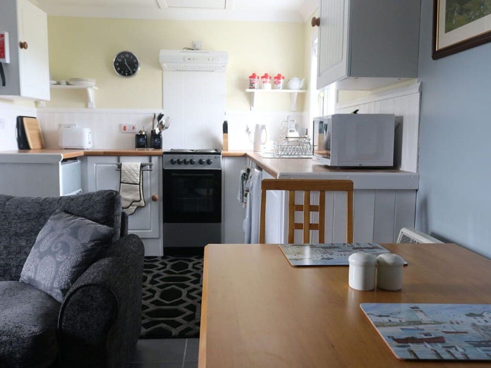 Furniture, Picture Frame, Table, Cabinetry, Kitchen Appliance, Kitchen, Interior Design, Wood, Countertop, Home Appliance