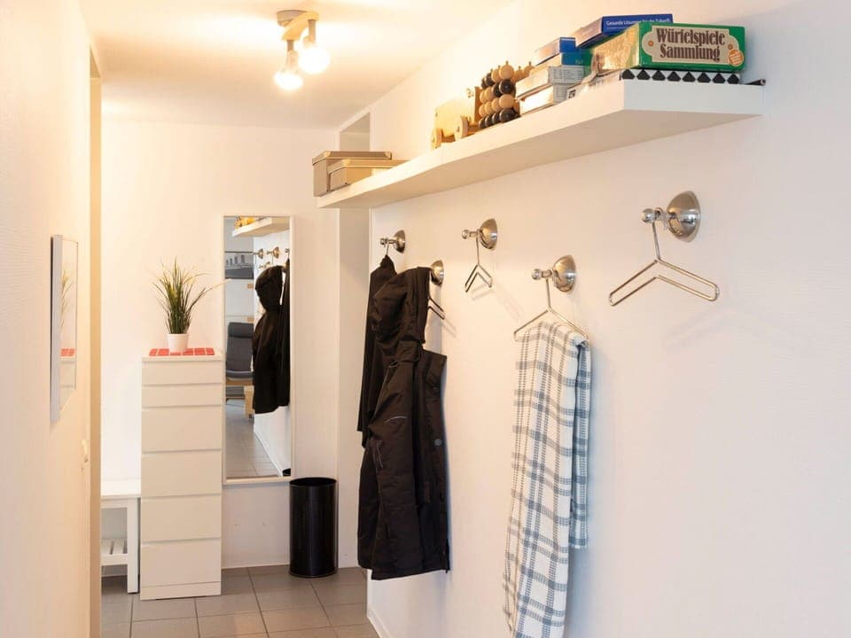 Wall, Interior Design, Flooring, Shelving, Floor, Shelf, Lighting, Room, Ceiling, Home