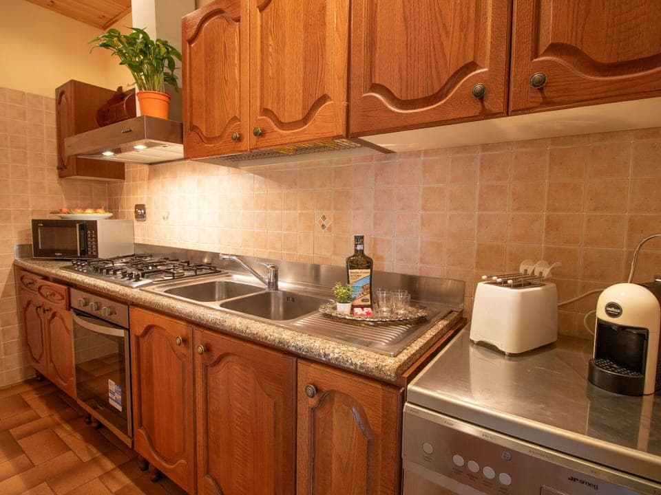 Brown, Cabinetry, Countertop, Property, Sink, Kitchen Sink, Kitchen Stove, Kitchen, Kitchen Appliance, Wood