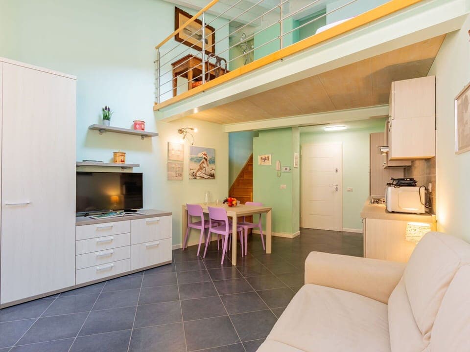 Furniture, Property, Cabinetry, Building, Wood, Interior Design, Living Room, Orange, Comfort, Countertop