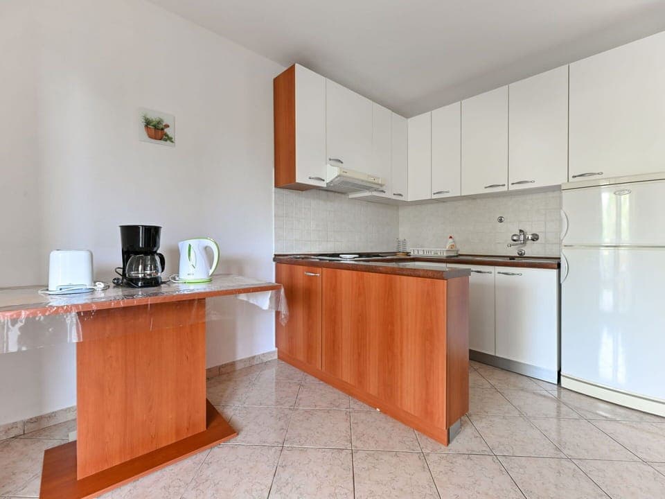 Cabinetry, Countertop, Building, Sink, Tap, Kitchen, Wood, House, Flooring, Floor