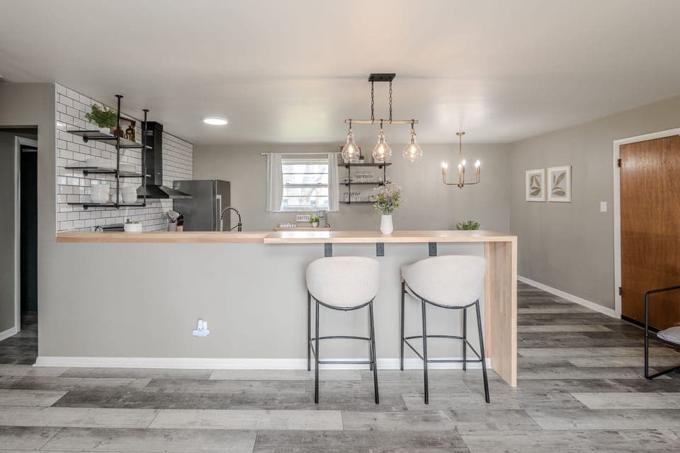 Open Concept Living Room, Dining Room, Kitchen and Bar Area!