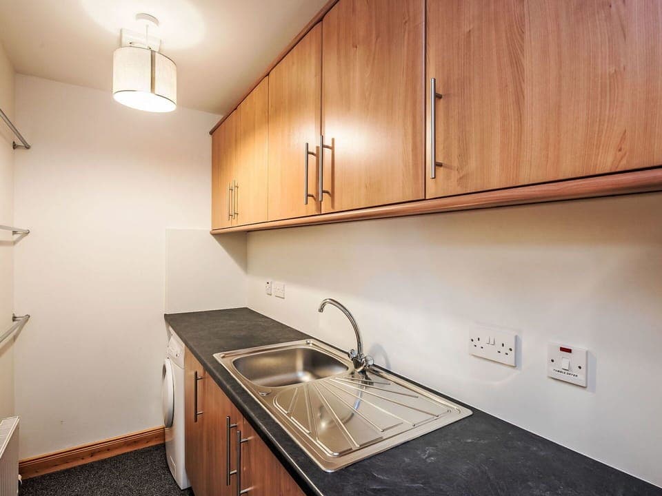 Brown, Tap, Kitchen Sink, Cabinetry, Property, Sink, Countertop, Plumbing Fixture, Furniture, Kitchen