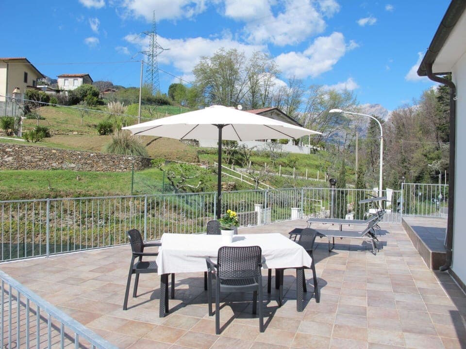 Plant, Cloud, Sky, Furniture, Property, Table, Building, Umbrella, Shade, Outdoor Furniture