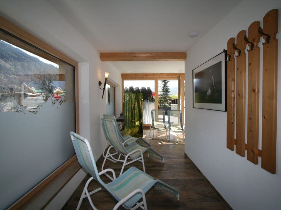 Property, Furniture, Wood, Plant, Houseplant, Building, Picture Frame, Hall, Flooring, Chair