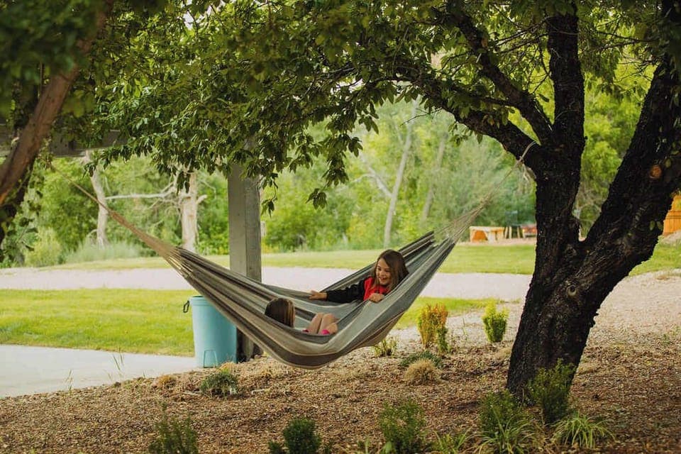 Unwind in the shady hammock—perfect for a peaceful nap or reading under the trees.