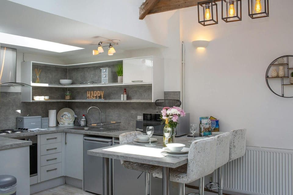 Wall and floor cupboards and open shelving.