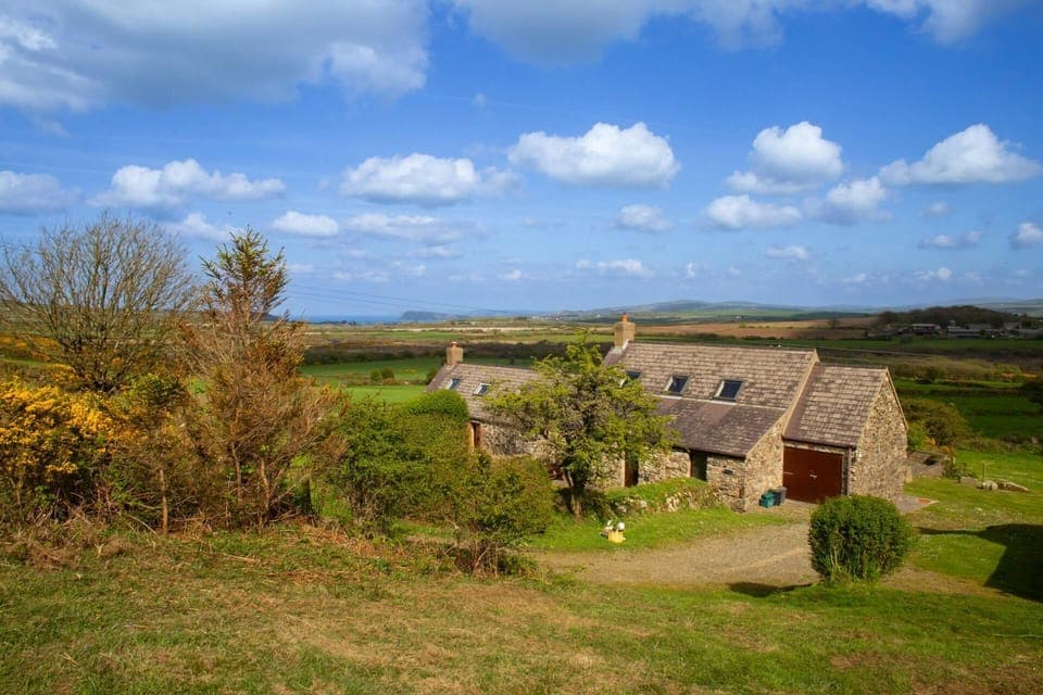 View over Y Bwthyn cottage and the surrounding countryside