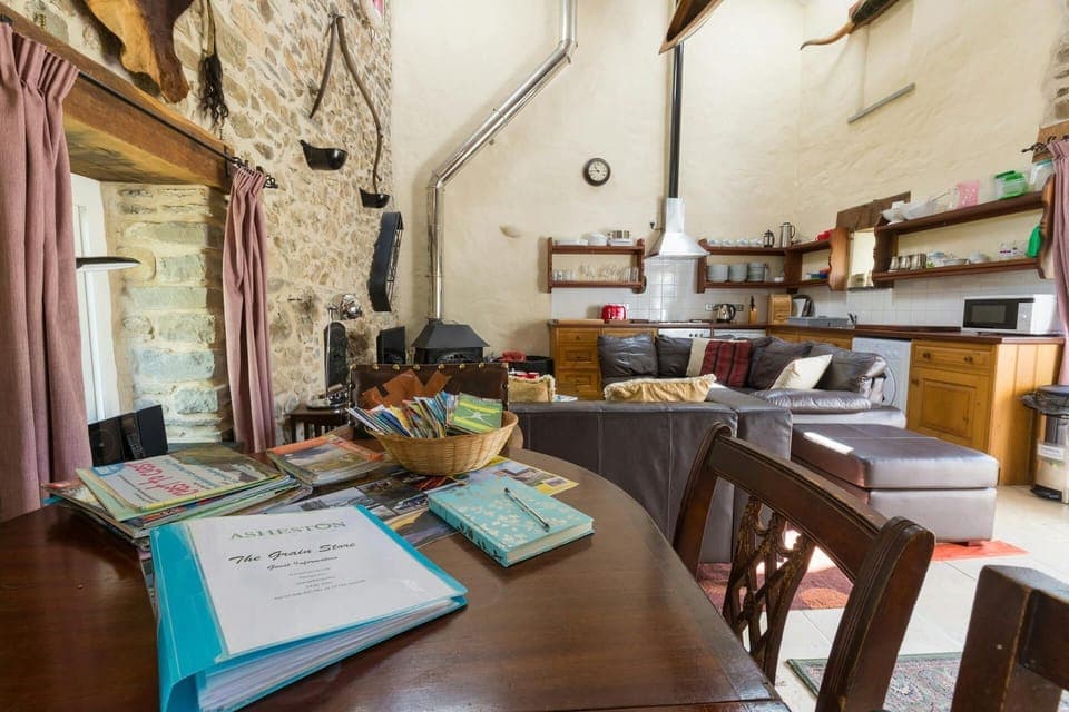 Open plan kitchen/living/dining area: well equipped fitted kitchen, sofas, dining table and chairs