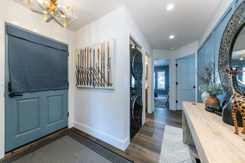 The view from the entryway towards the shared bathroom and the 2 bedrooms.
