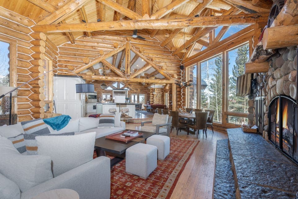 Living Room - Charming rustic living space with wood-burning fireplace and comfortable seating