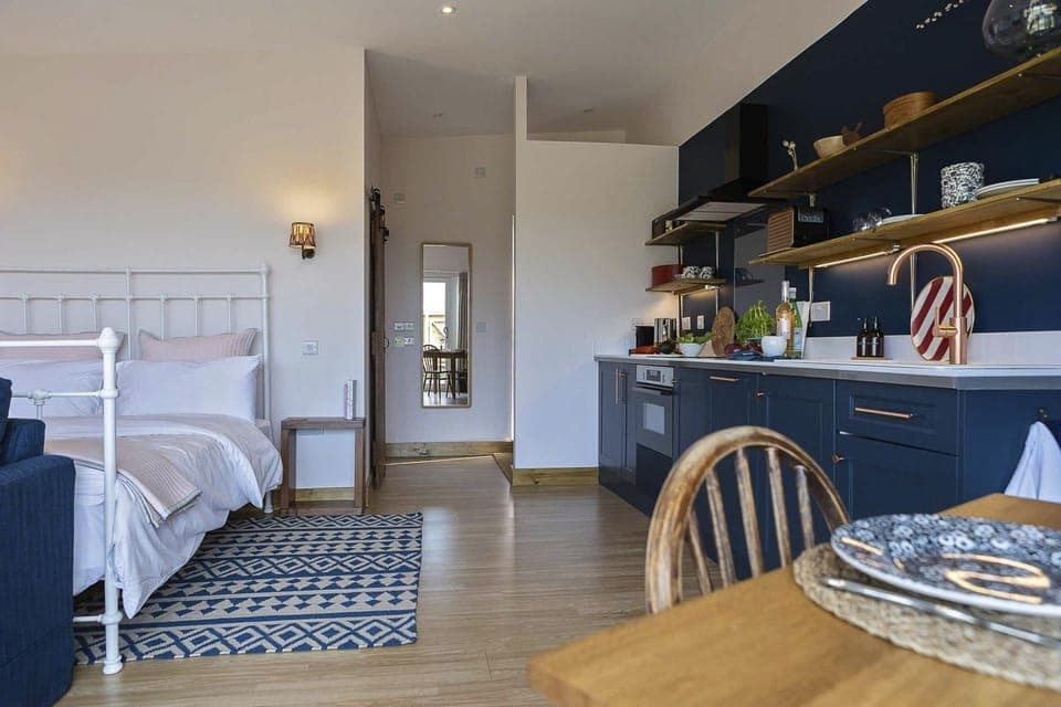 The Hoot - kitchen and bedroom