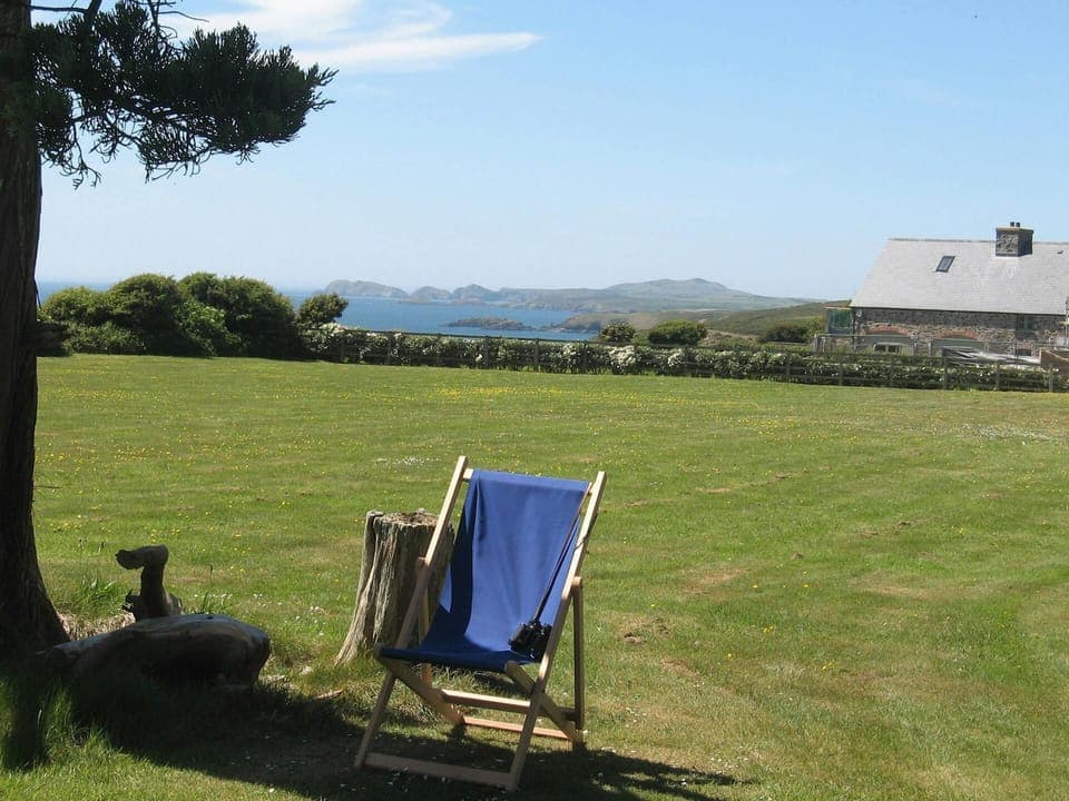 Large lawn with sea views