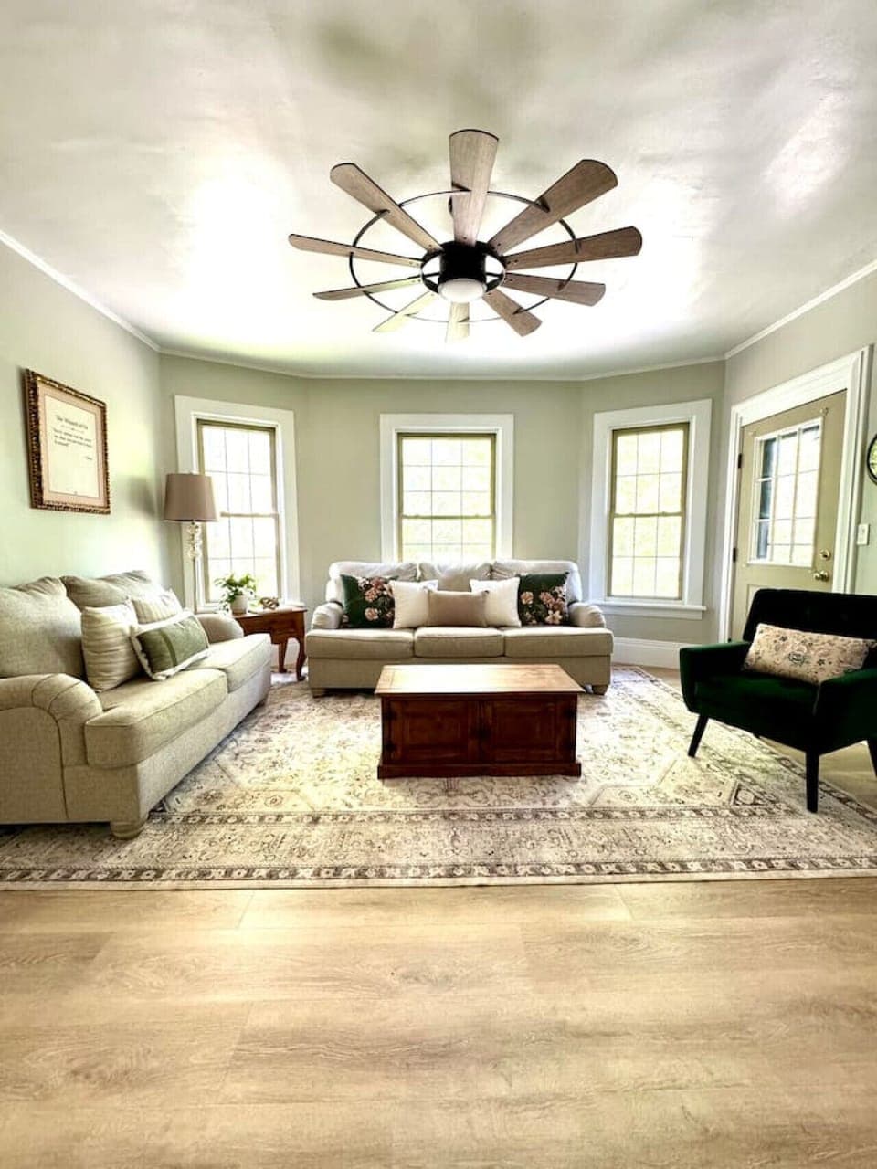 Come relax in our living room featuring a flat screen mounted TV with plush sofas with tons of natural light.