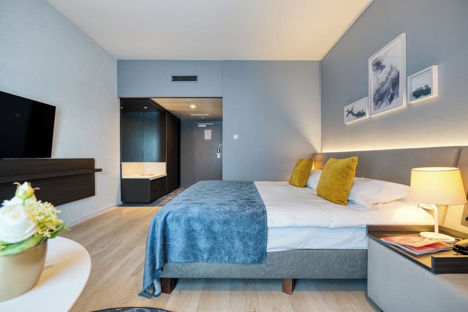 Junior Suite with Terrace | Minibar, in-room safe, soundproofing, iron/ironing board