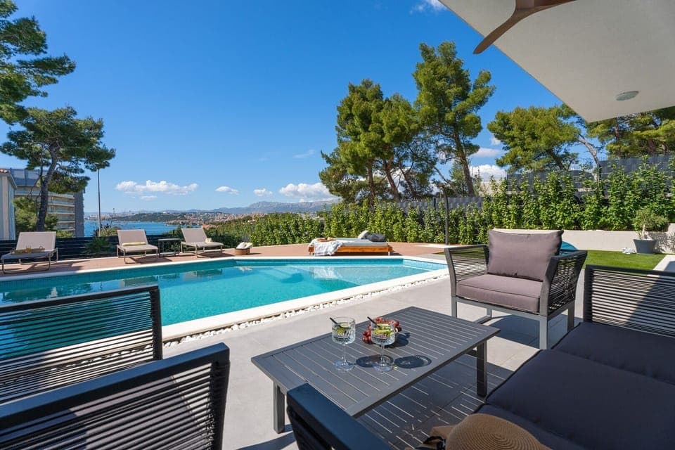 Stylish 5-bedroom villa Aride with heated pool, gym, pool table, sauna, sea views