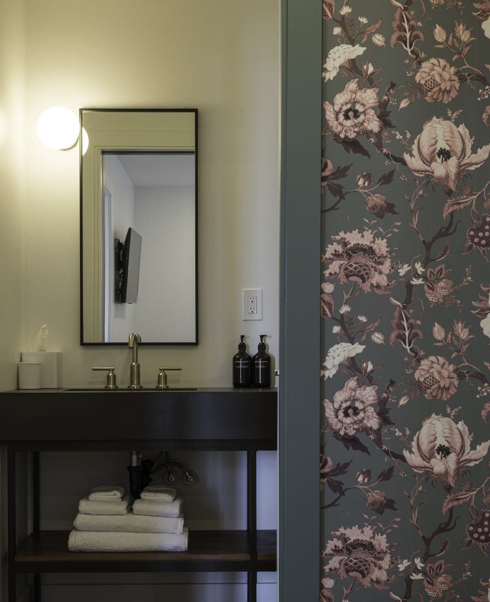 Shower, designer toiletries, hair dryer, bathrobes