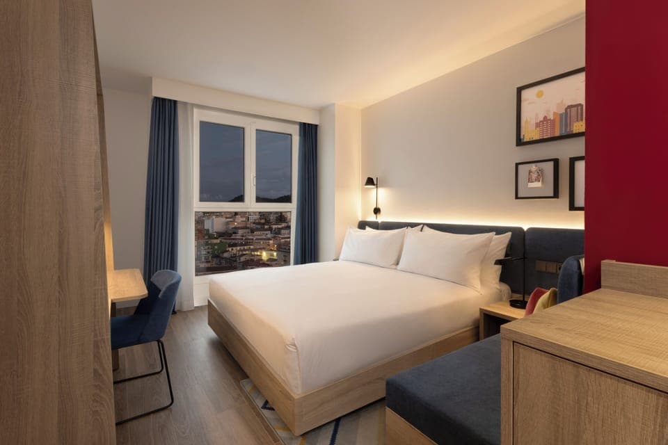 Premium bedding, memory foam beds, minibar, in-room safe