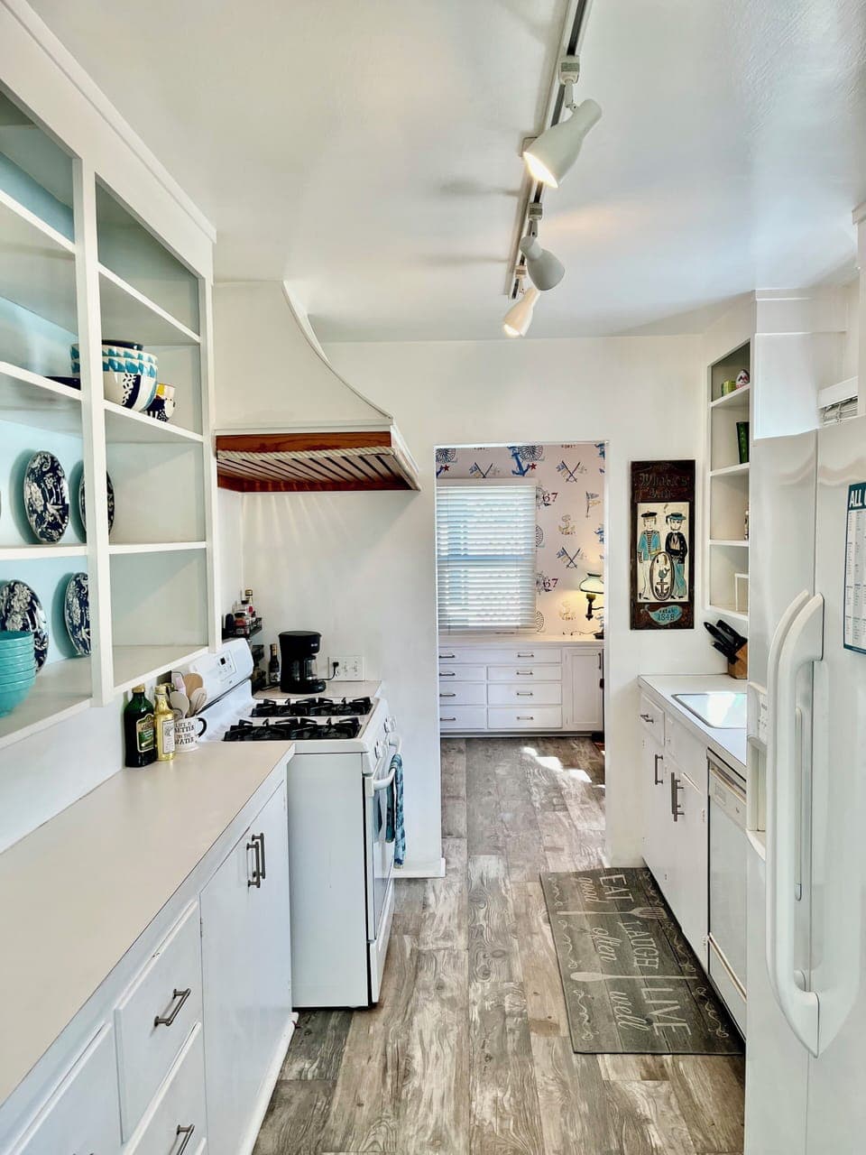 Fully equipped kitchen with spices, cooking oils, pots & pans.