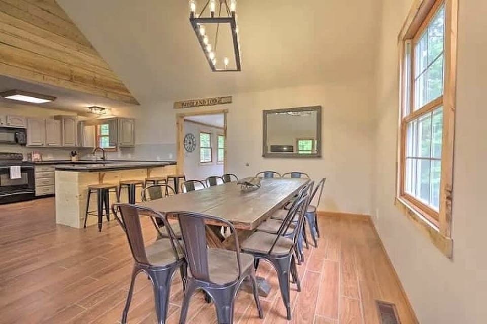 Gather around this spacious dining table for laughter-filled game nights, festive meals, and a lifetime of memories in a bright, inviting space that's perfect for bringing everyone together.