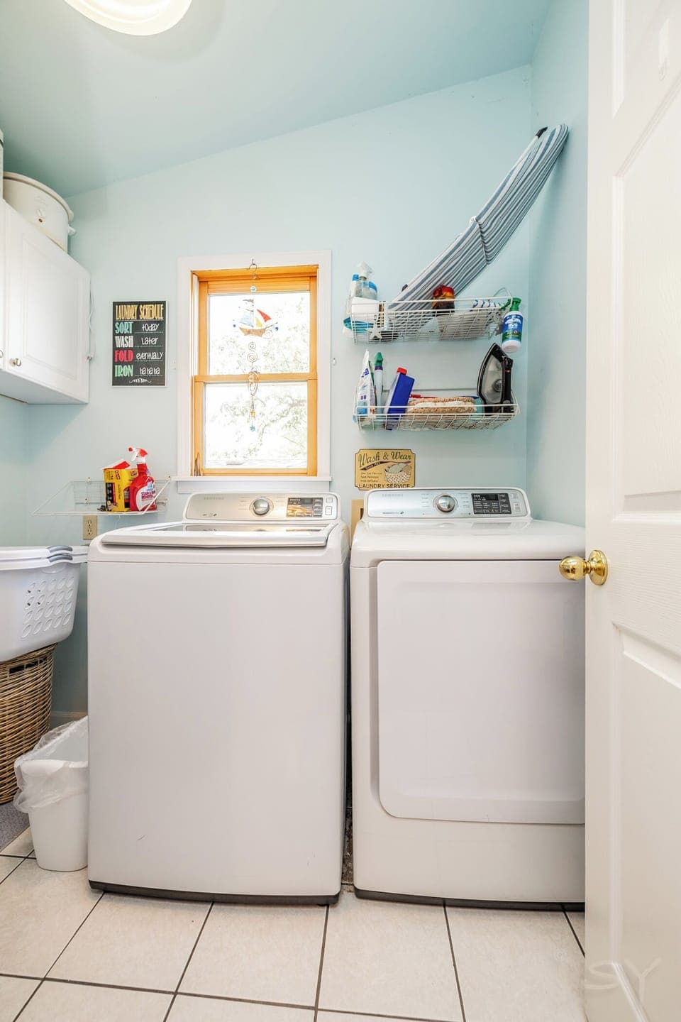 enclosed laundry room attached to kitchen 