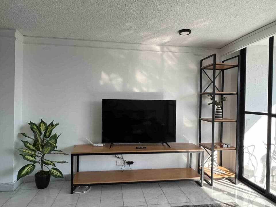 A Smart TV in the sitting room that can connect to your streaming accounts.