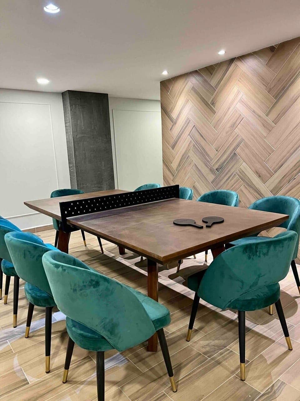 A versatile dining table for 8 that transforms into a ping pong table.