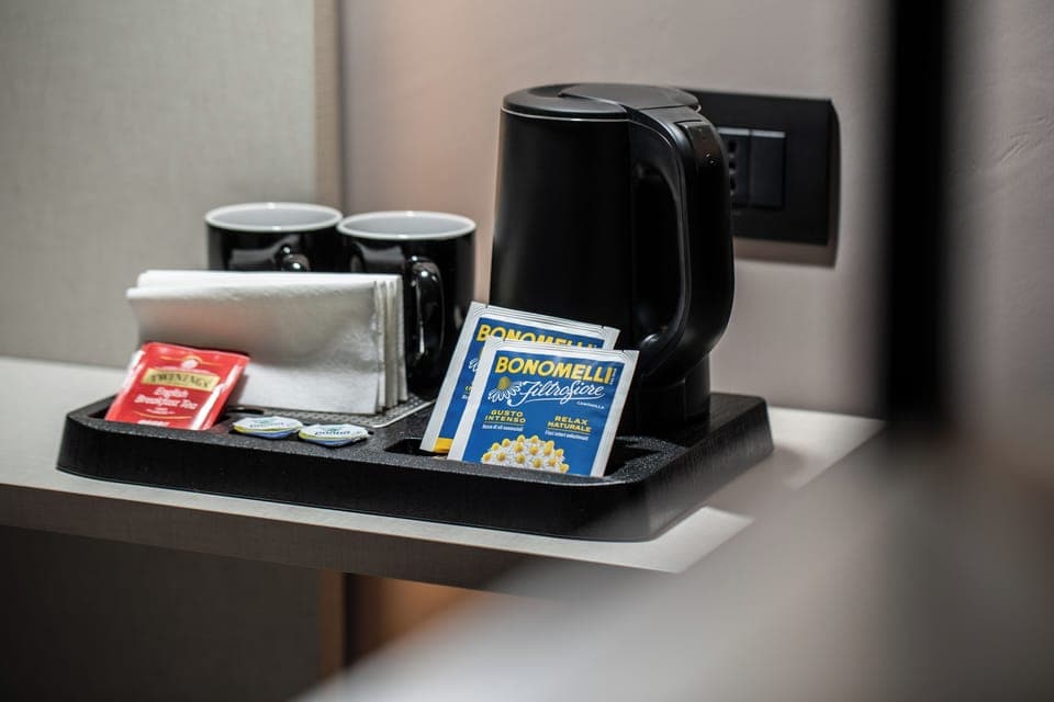 Premium bedding, down comforters, memory foam beds, minibar