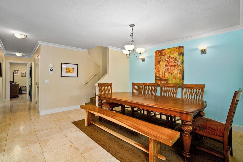 Island artwork and decor adorn the walls.