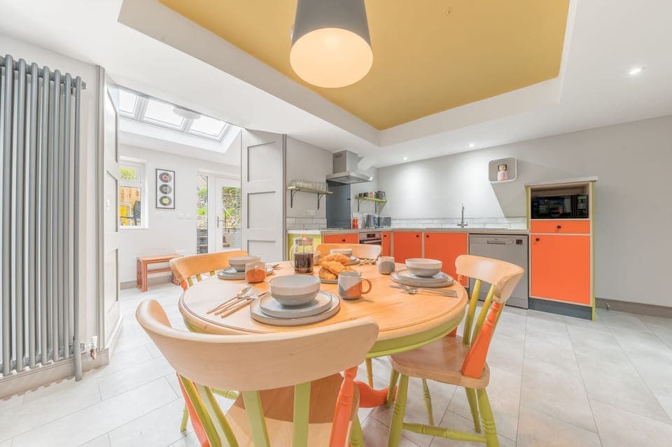 The kitchen has been decorated in a 70's style