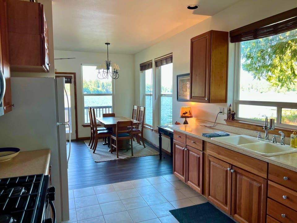 Savor the lakeside lifestyle in our thoughtfully equipped  kitchen. Where culinary delights meet waterfront views, every meal becomes a moment to cherish. 