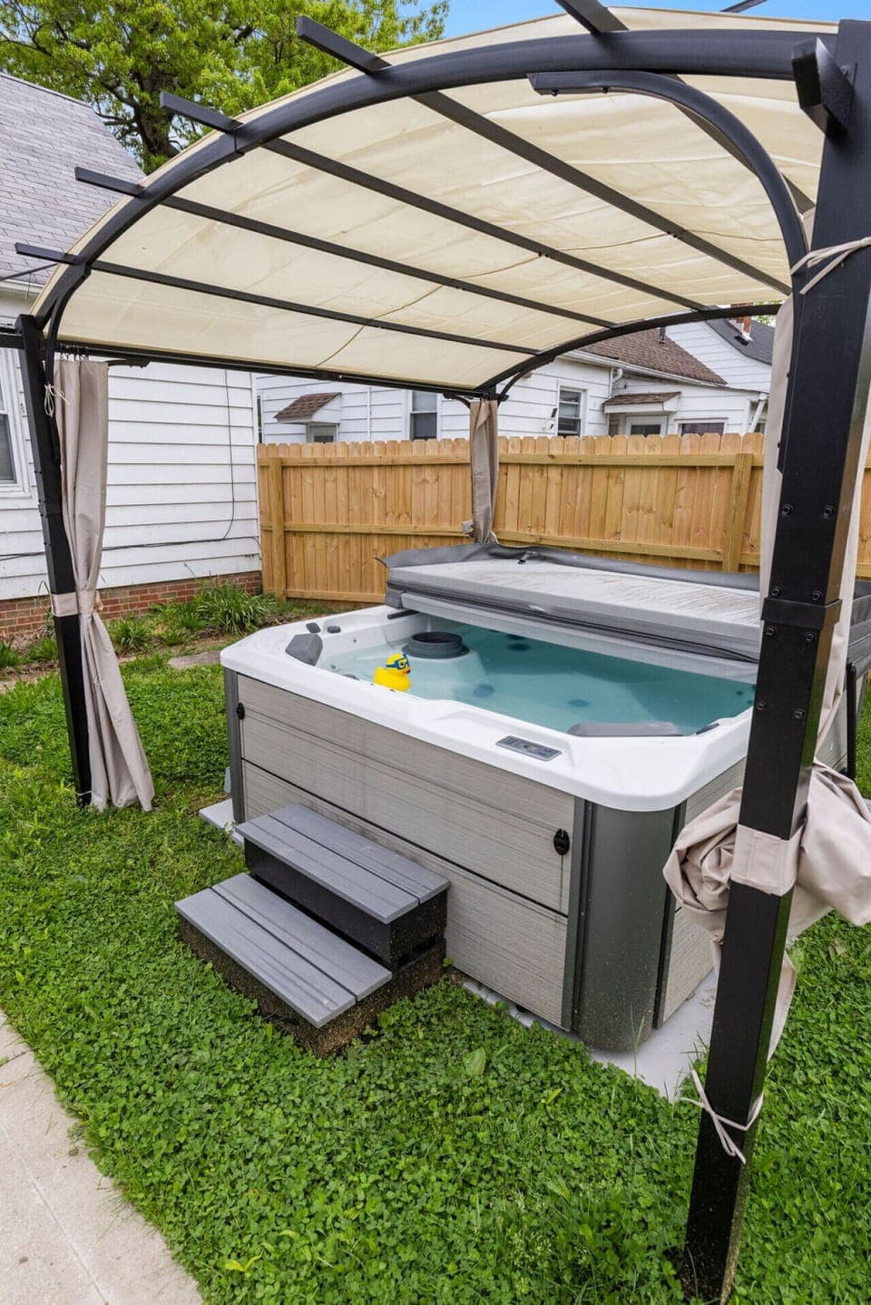 Indulge in relaxation within this inviting hot tub