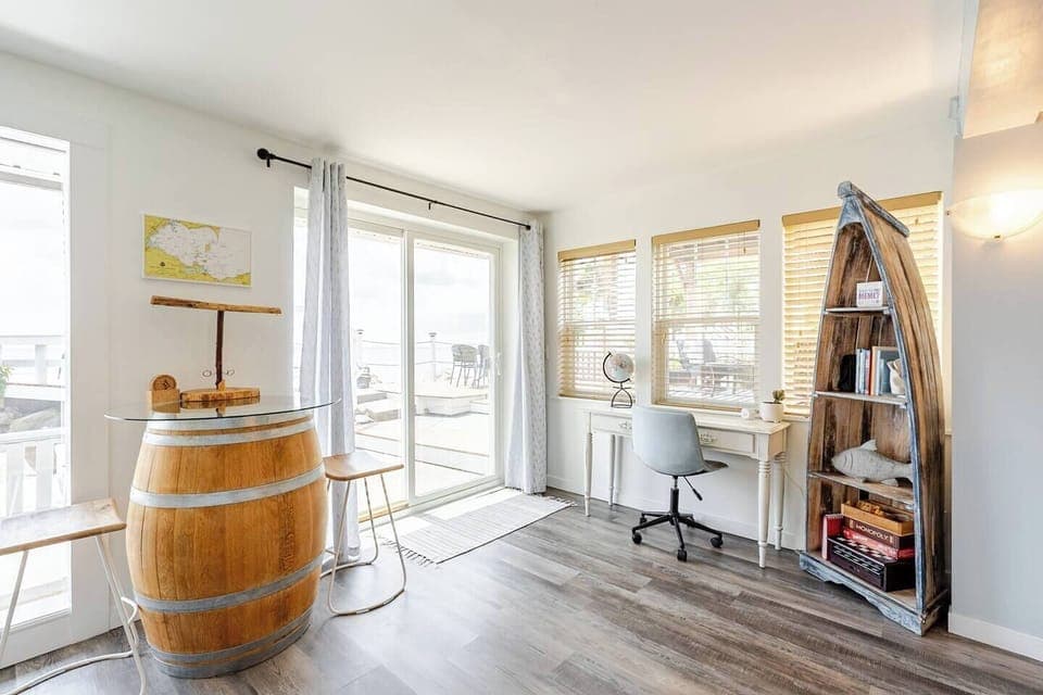 Work or play. Bar top wine barrell, games and books available, or a small desk for those who need to work