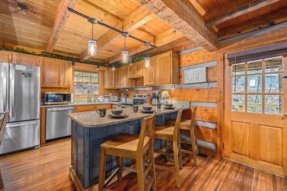 Beautiful custom kitchen, tin paneling. The concept is open to entertain!