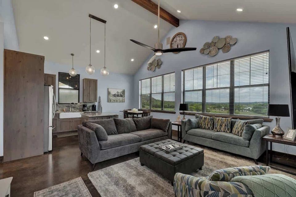 Bask in the natural light in the spacious living room.