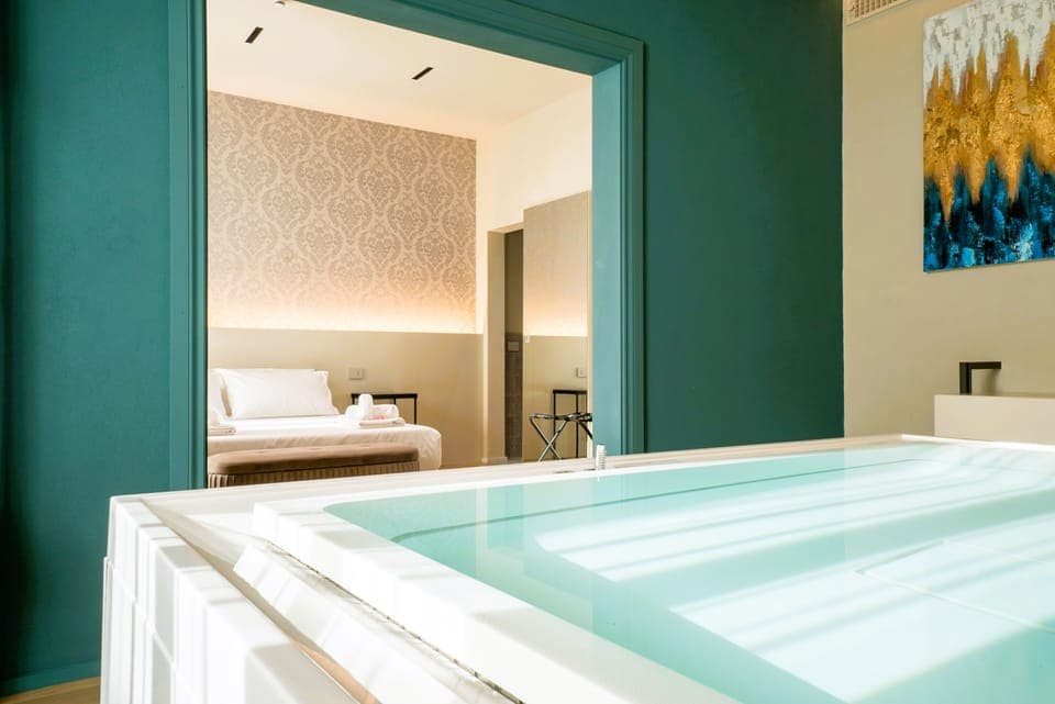 Premium bedding, down comforters, pillowtop beds, minibar