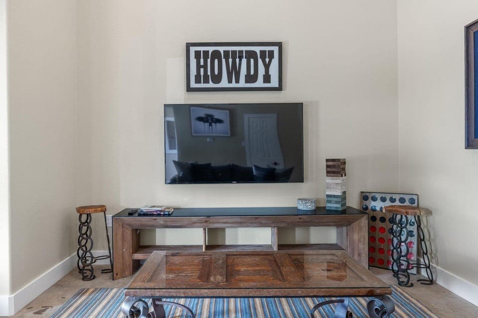 Back Living Room with Smart TV for the Perfect Movie Night Spot