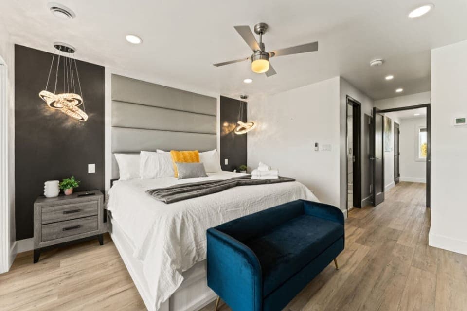 King Bedroom with Crisp white walls create a serene retreat.