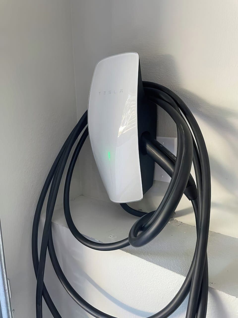 Level 2 car charger (Telsa with J1772 adapter) available.