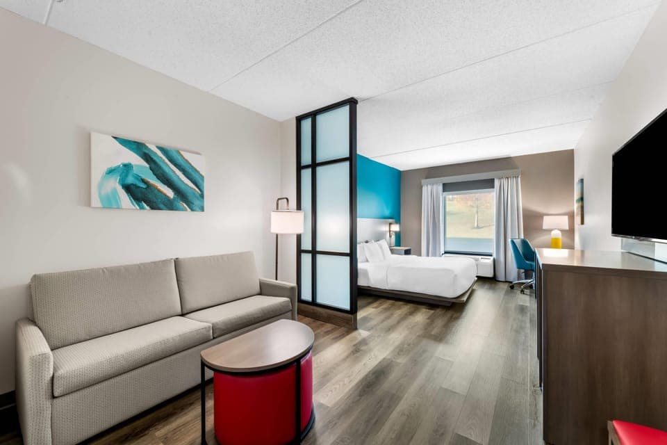 Premium bedding, desk, blackout drapes, iron/ironing board