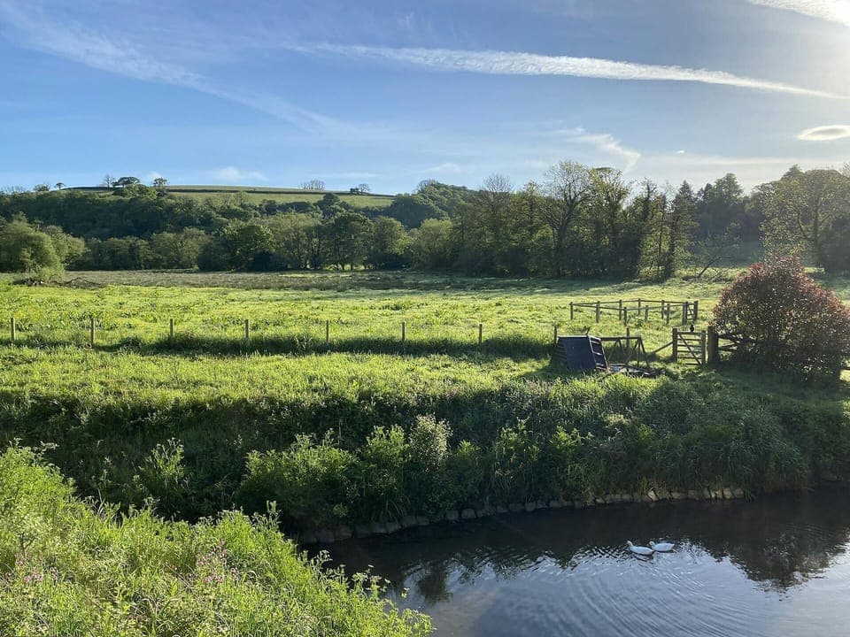 Views from the cottage garden over the river and fields