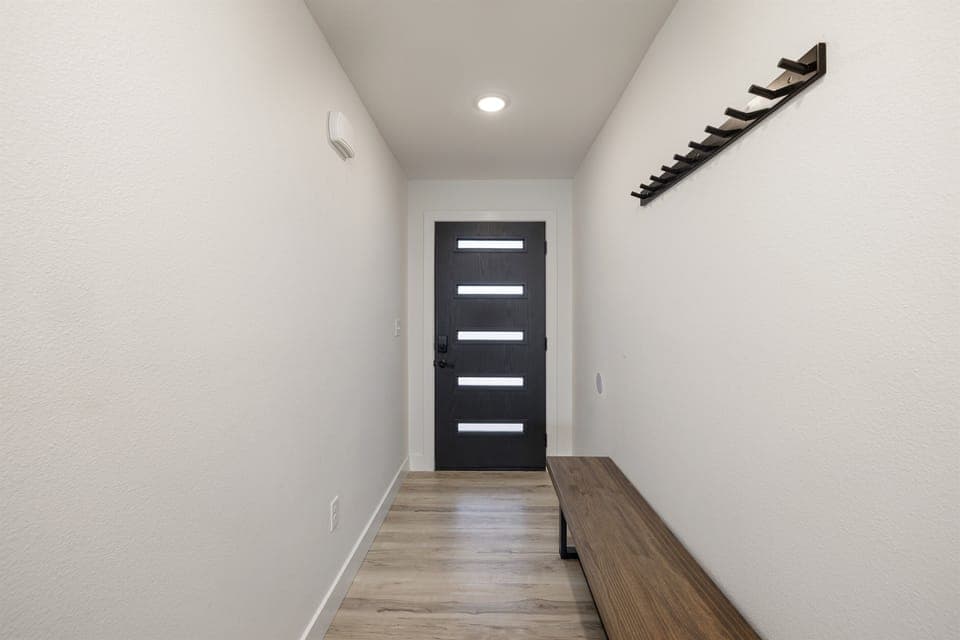 Main Level: Entry w/ bench & coat rack