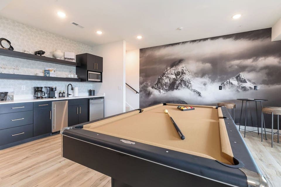 Lower-level game room is ready for your billiards competition