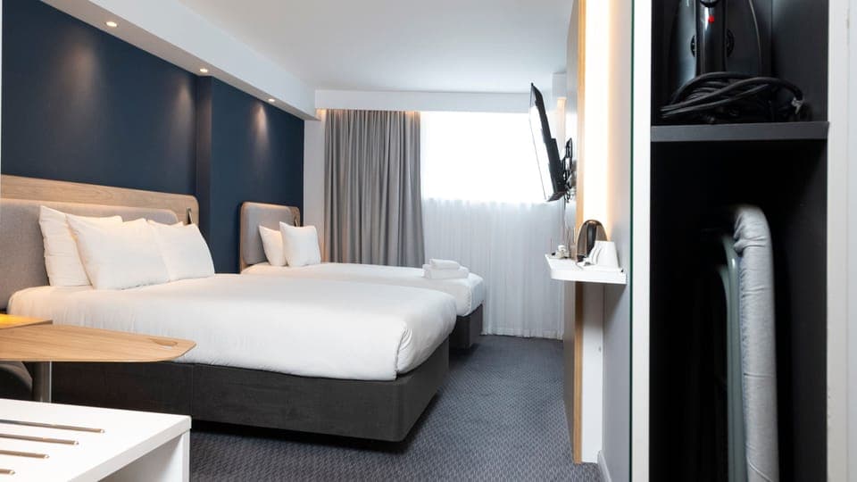 Standard Room, Multiple Beds (Free Hot Breakfast) | Desk, blackout drapes, free cribs/infant beds, free WiFi