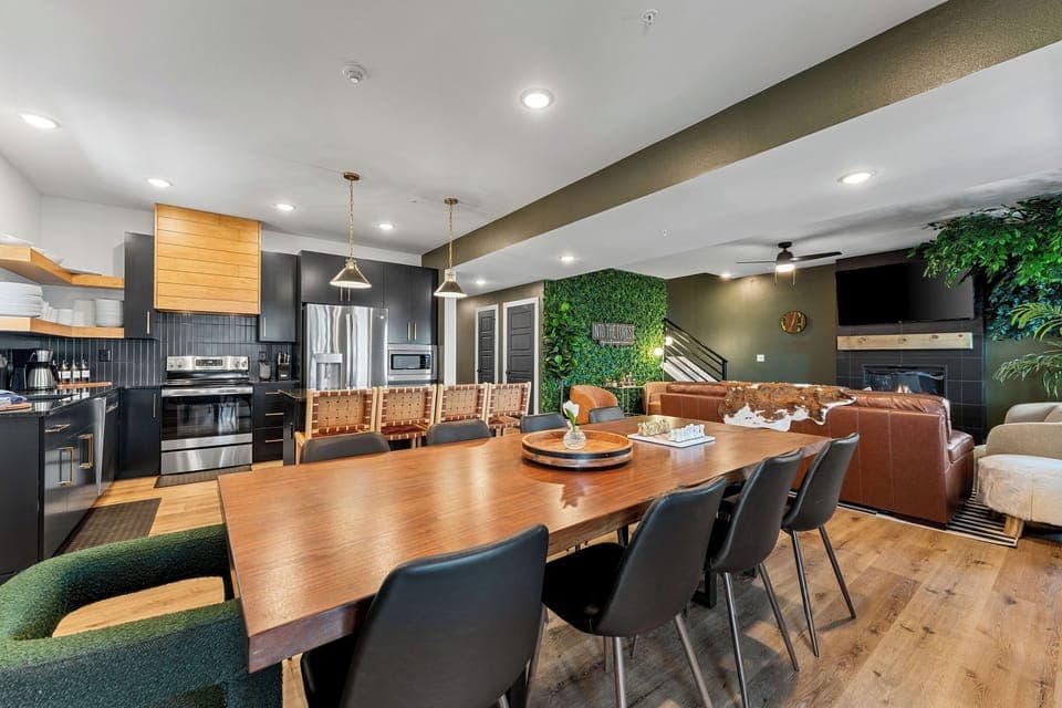 Gather around the custom-built dining table with plenty of seating for the whole crew—ideal for shared meals and lasting memories.